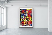 an abstract painting hangs on a wall in a room